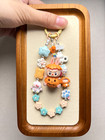 Breloque téléphone perlée POP fait main : breloque Kawaii avec mini fève Labubu [1 seul]