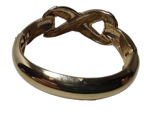 Brazalete vintage con bisagras Infinity Clamper tono dorado anudado - Imagen 4 de 10