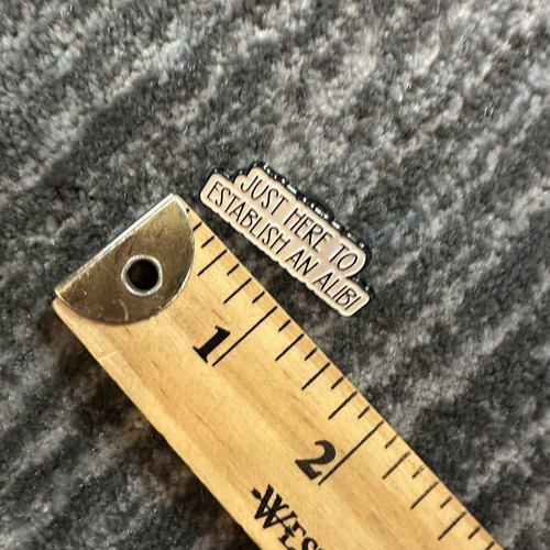 Alibi Enamel Pin Just Here To Establish Spell Out Lapel Backpack True Crime New - Picture 3 of 4