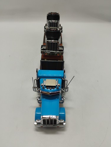 Matchbox Ultra 1:58 Scale Paclease Peterbilt 359 KS192 SA Flatbed Transporter - Picture 11 of 12