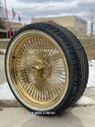 (4) 22X8 Titanium Gold Wire Wheels On (4) 265/35R22 Gold/White Vogue Tires