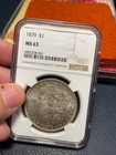 (#100306) Morgan Silver Dollar: 1879.  NGC MS 63.  Better Date.  — photo 2