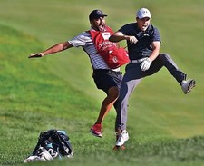 A Jordan Spieth Jumping With Cap On Mouth Open 8x10 Photo Print