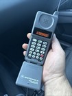 Vintage Motorola Brick Flip Cell Phone With Battery Powers On.