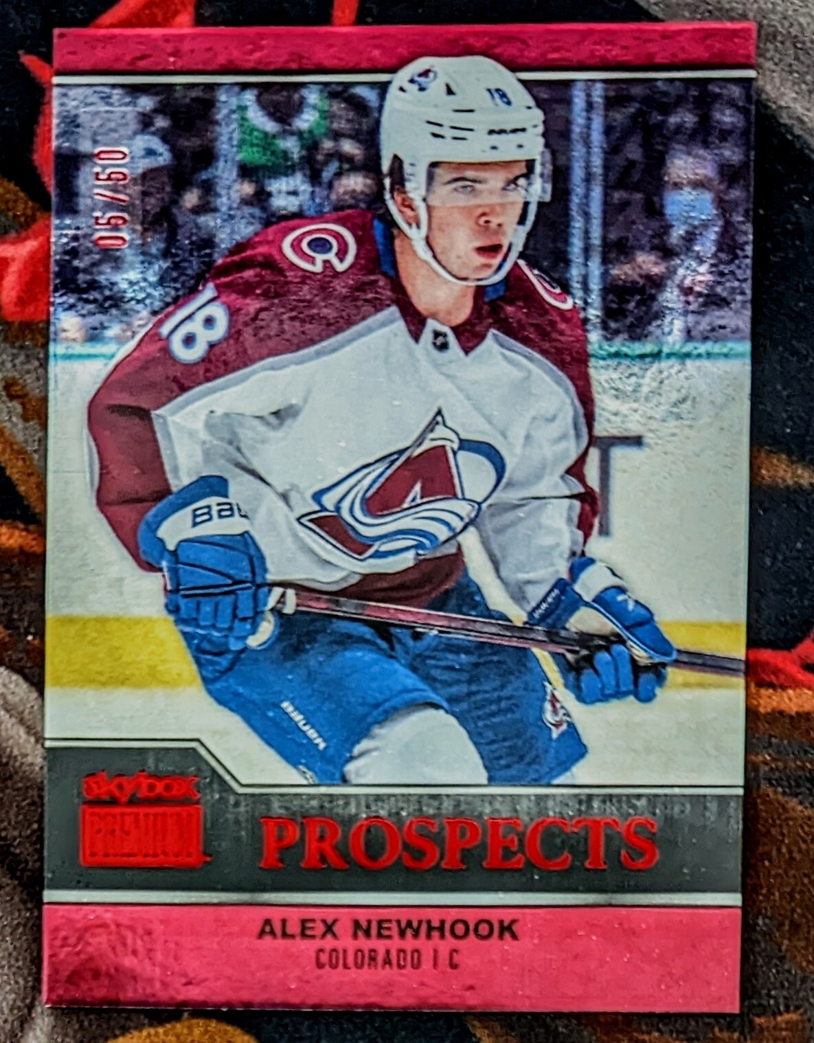 2021-22 Skybox Metal Universe Hockey Alex Newhook Premium Prospects Ruby 05/50