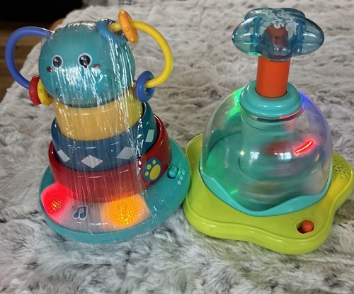 Baby Lernspielzeug Kreisel mit Musik und Farbstapel Babyringen