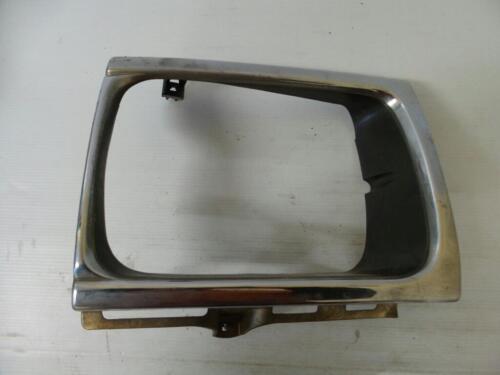 TOYOTA HILUX RIGHT HEADLIGHT SURROUND 10/88-09/97 88 89 90 91 92 93 94 95 96 97 - Picture 1 of 2