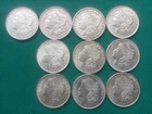 HALF ROLL OF TEN(10) 1921-P MORGAN SILVER DOLLARS IN NICE CONDITION