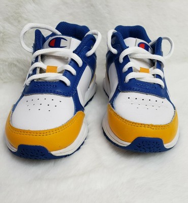 blue and yellow champion shoes