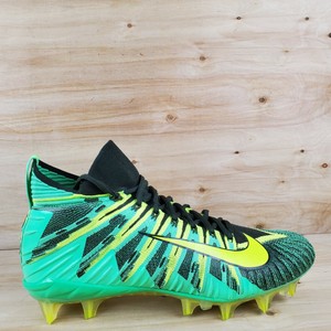 green and gold nike football cleats