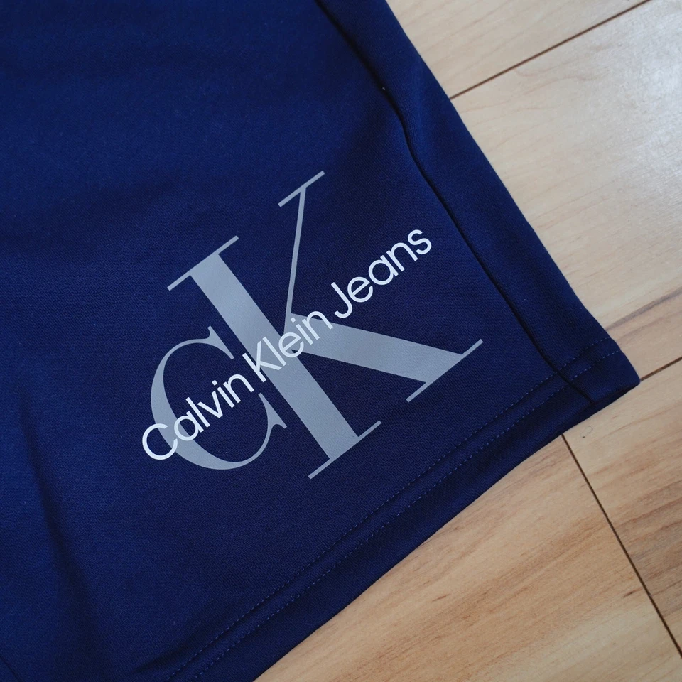 NWT Calvin Klein Jeans Men's Regular Fit Drawstring Monogram Logo Fleece Shorts - Image 3 of 4