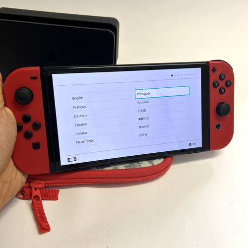 Nintendo Switch OLed Console | 64GB | con Gioco FIFA 19 e Cover Super Mario BROS - Imagen 22 de 23