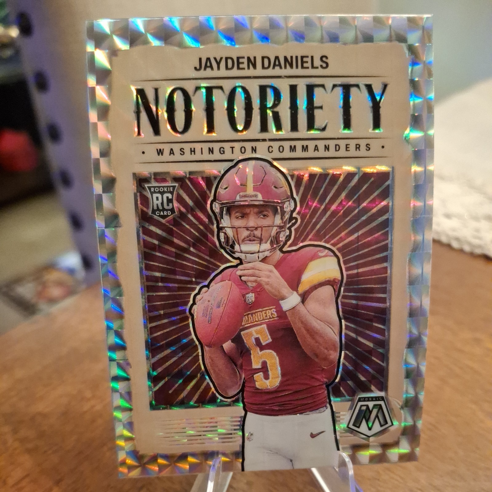 2024 Panini Mosaic Jayden Daniels Notoriety Silver Mosaic (RC) #119 Commanders