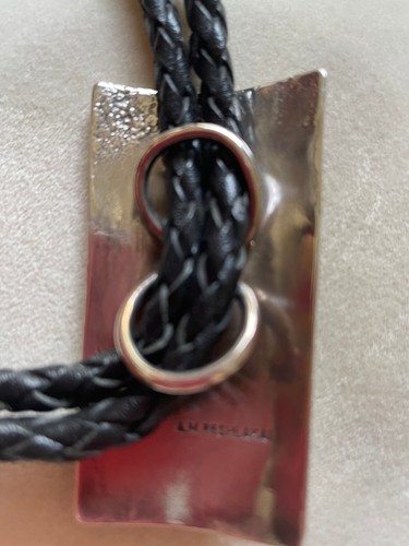 NAVAJO STERLING SILVER BOLO A.M PESHLAKAI CORAL STONE SET IN BEAR CLAW - Picture 4 of 8