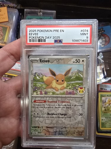 Eevee Pokemon Day 074/131 Prismatic Evolutions Stamped Promo English PSA 9 Holo