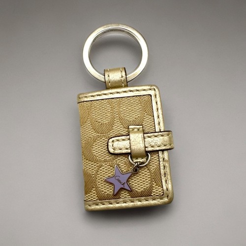 Coach Signature Crema Púrpura Estrella Dije Marco Foto Soporte Llavero Llavero - Imagen 1 de 4