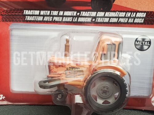 DISNEY PIXAR CARS TRACTOR WITH TIRE IN MOUTH METAL 2022 SAVE 6% GMC - Picture 1 of 3