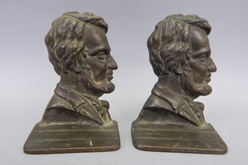 Par de sujetalibros antiguos pequeños de hierro fundido Abraham Lincoln perfil extremos de libro - Imagen 1 de 3