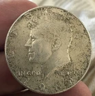 1964 Silver Kennedy Half AU with a little bit of tarnish