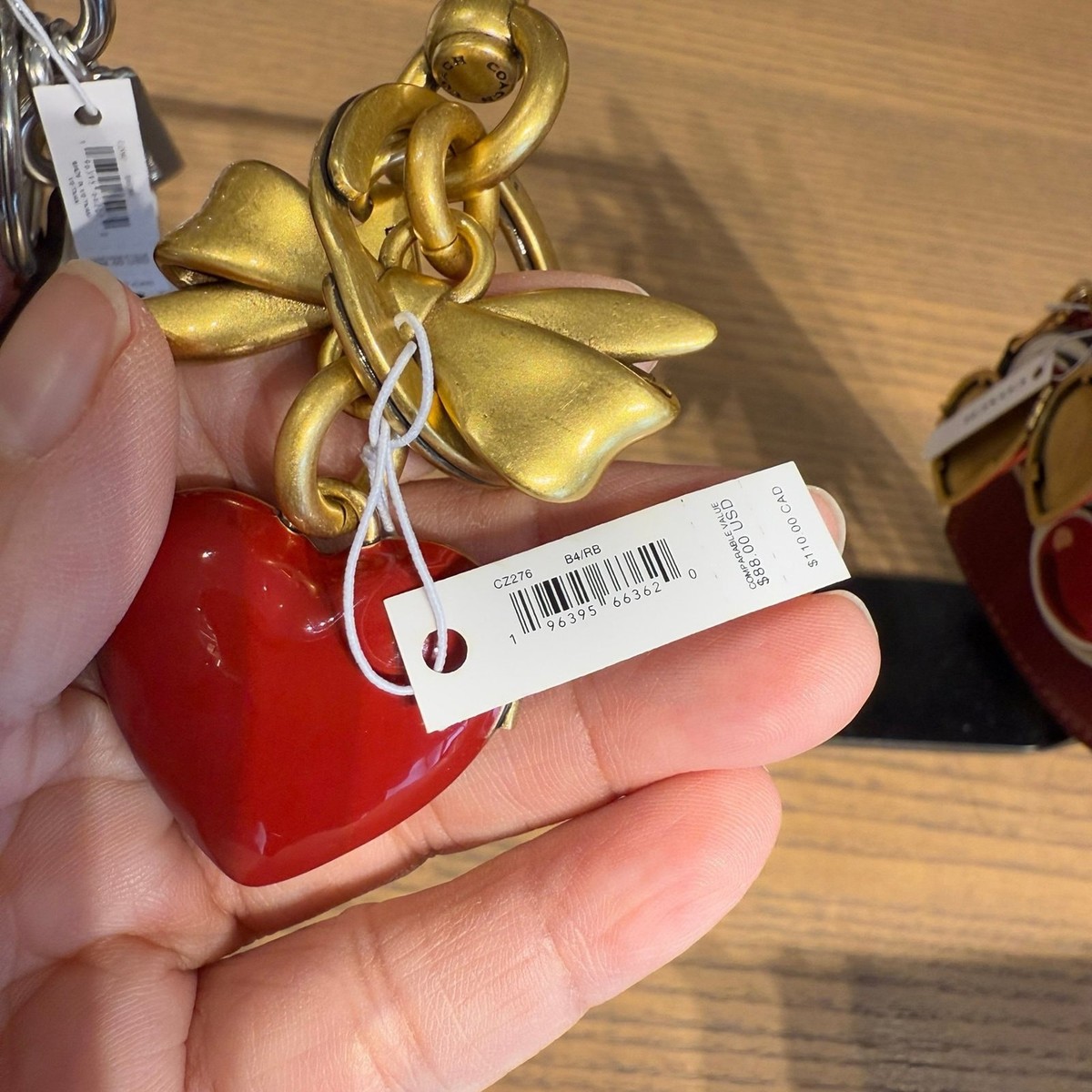 COACH コーチ　ボウ　ハート　ロケットバッグチャーム bagにつけて】COACHボウ ハート ロケット バッグ チャーム