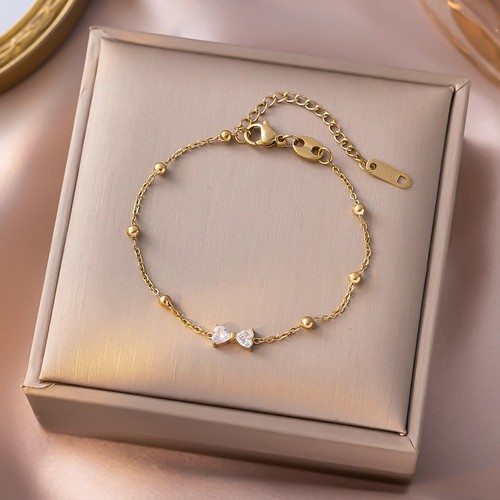 Einzigartige Goldkette für Damen mit stilvoller Schmetterlingsschleife und Zirk - Bild 7 von 14