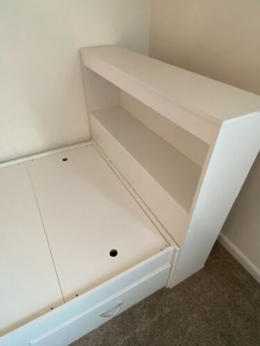 White twin size bed with headboard, bookshelf, and three wide storage drawers. - Picture 3 of 5