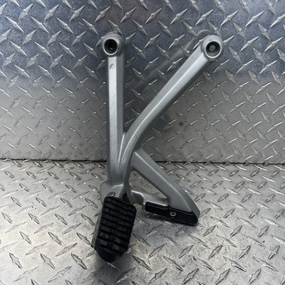 2013 TRIUMPH TIGER 1200 LEFT REARSET FOOT PEG BRACKET 2082162 A.11