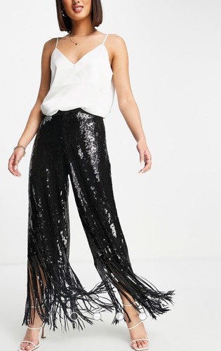 Pantaloni River Island con paillettes e nappa e frange e orlo colore nero. Prezzo consigliato £50 Regno Unito più 26! - Foto 2 di 14