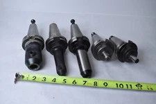 USED LOT OF 4 HOLDERS W/ CAT40, TECHNIKS, KENNAMETAL, LYNDEX