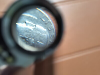 ロイヤルアンバー 不規則な形状 一部が切り取られた 1967 Quarter with ring error, ring error on front of the