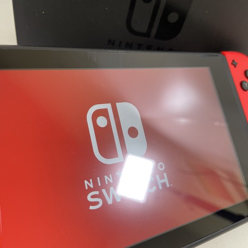 Nintendo Switch V2 Neon Purple & Neon Orange 32GB Console - Picture 6 of 12