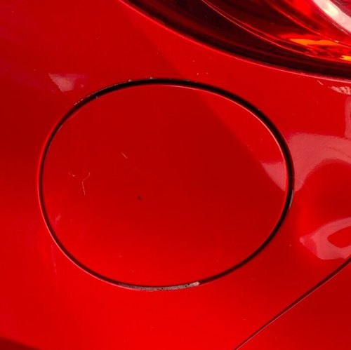 Mazda 2 - 2007-2014 - fuel flap - petrol flap red - breaking - 337 - Picture 1 of 7