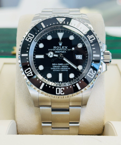 Montre Rolex Sea-Dweller 126660 en acier inoxydable Oyster lunette en céramique noire B/PAPR