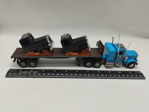Matchbox Ultra 1:58 Scale Paclease Peterbilt 359 KS192 SA Flatbed Transporter - Picture 4 of 12