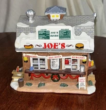 2005 Lemax Village Collection “Joe’s Burger & Hot Dog Stand” #55214