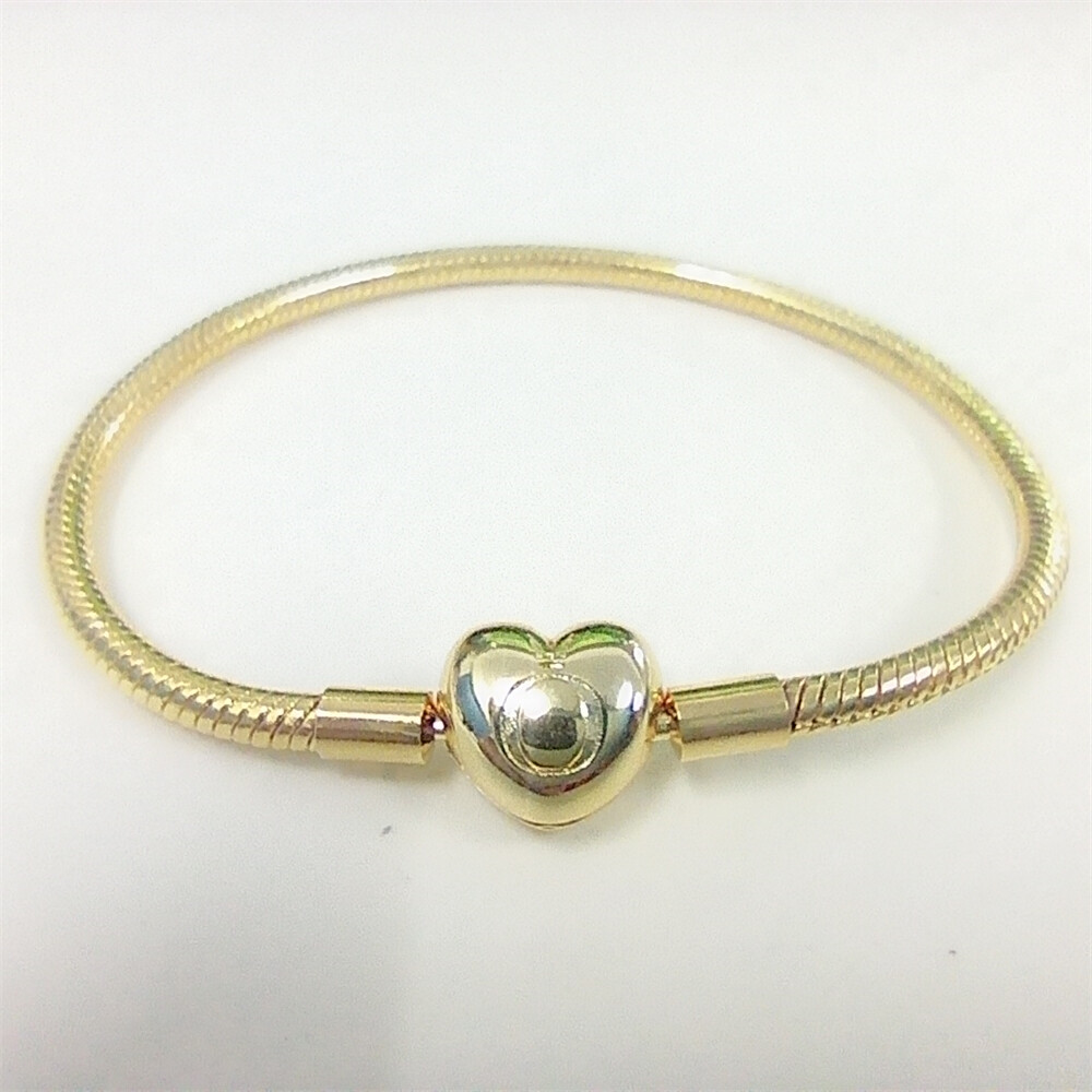pandora momentsgold snake chain & gold-plated heart clasp bracelet with