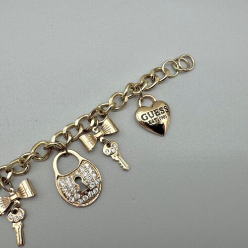 Guess Bracelet Womens Gold Tone Logo Heart Rhinestone Lock Key Charms 7 Inch - Picture 6 of 14