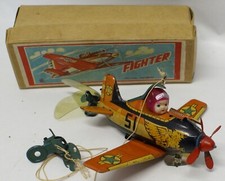 Vintage NOMURA Japan Tin  Celluloid Wind-up Toy Fighter Plane 15A Airplane