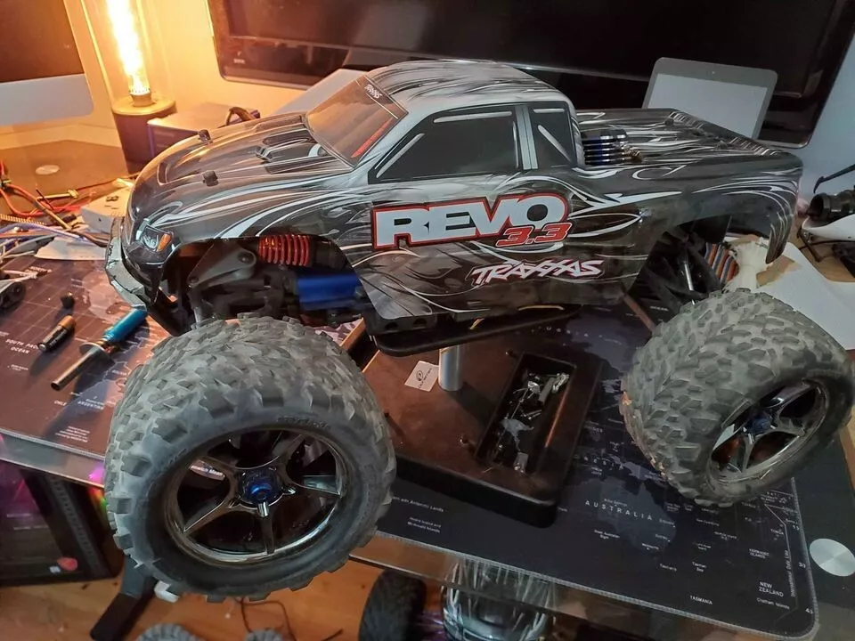 Traxxas Revo 3.3 Package 2 Trucks DX5 Rugged remote and Tons of spare parts