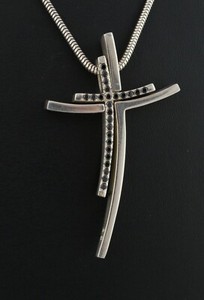 Stone set cross. Very large and chunky sterling silver cross set with Amethyst cubic zirconias