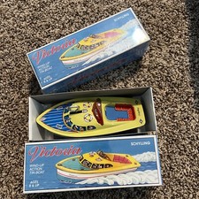 2 Victoria putt-putt Boat 1 Sealed 1 Opened