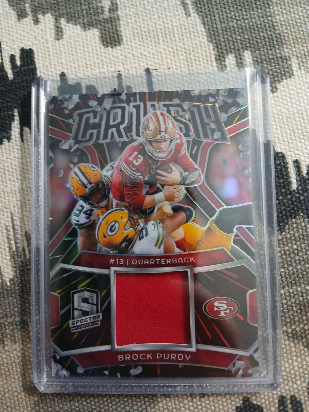 2024 Panini Spectra - Crush Brock Purdy #CRU-BPY Hyper Prizm /75 (MEM)