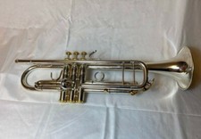 Accent Trumpet With Case, MouthPiece, Cleaning Cloth, And Cleaning Brush.