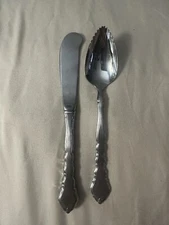 Oneida Community Stainless Satinique Grapefruit Spoon And butter Spreader