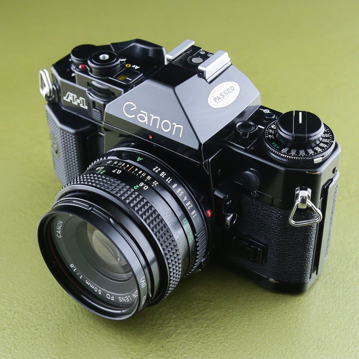 Canon A-1 camera body + 1.8 / 50 FD , A1 black 35 mm SLR