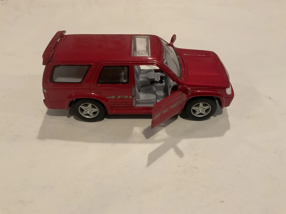SUV fundido a presión Kinsmart Toyota 4Runner rojo escala 1:36 raro Foto 3 de 4