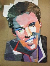 COLLAGE WALL ART OF ELVIS PRESTLEY PLUS HUMPHRY BOGART ON THE REVERSE.