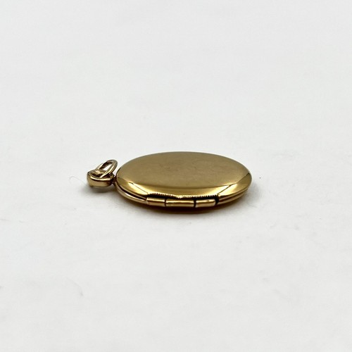 14k Yellow Gold Vintage Classic Engraved Oval Locket Pendant (LO1017583) - Picture 5 of 12