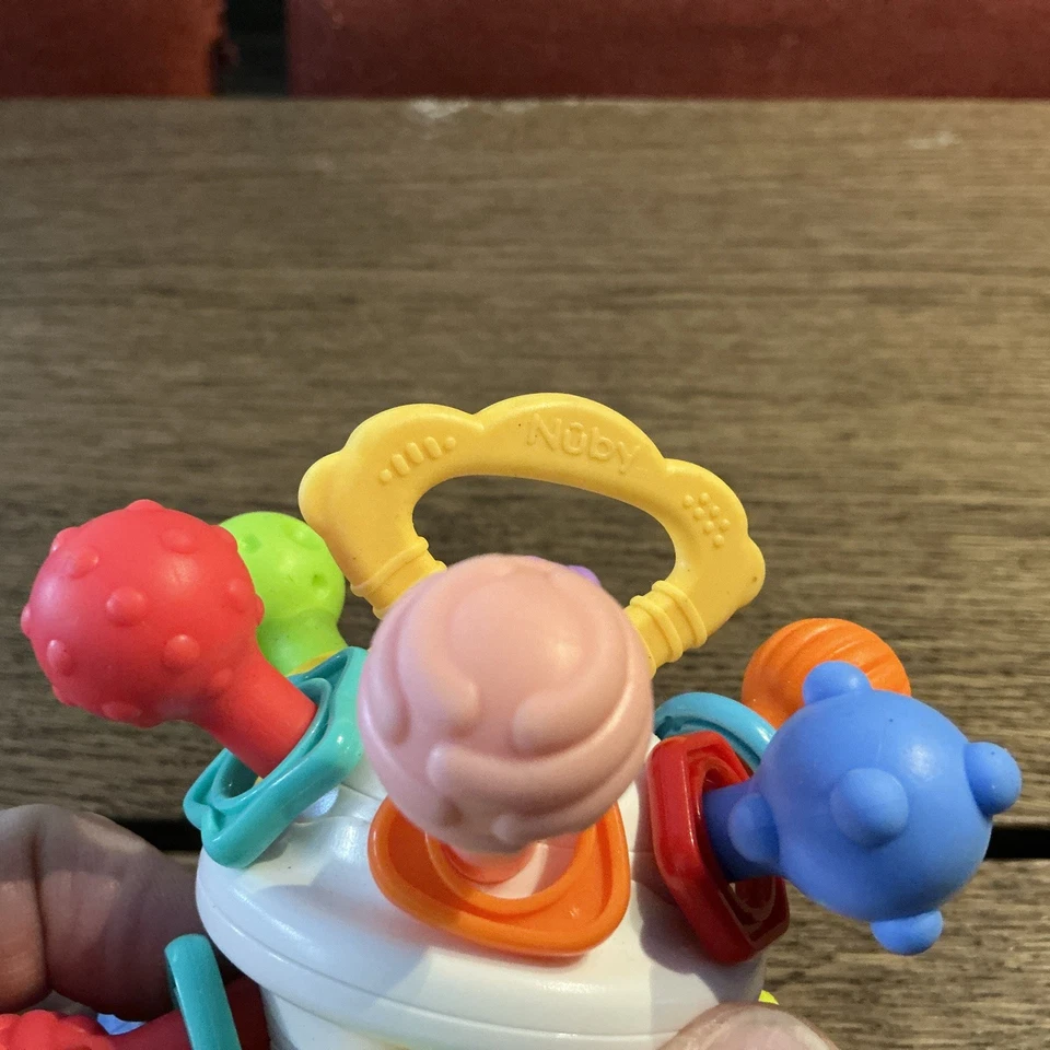 Nuby Textured Twist Ball Baby Teether Toy with Colorful Rattle - Image 2 of 4