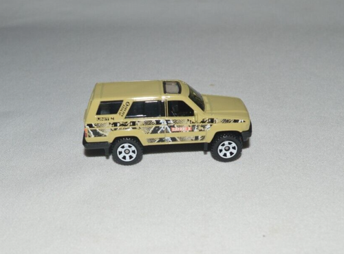 MATCHBOX 2023 MBX ADVENTURE II - EXCLUSIVE 1985 TOYOTA 4 RUNNER TAN LOOSE - Picture 7 of 8